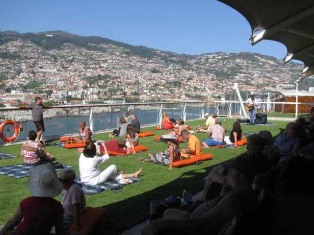 It is rough back on board. Real Grass and blankets and wine and cheese party as we sail away from Funchal